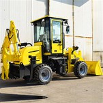 Backhoe loader kumpatt b'kabina magħluqa